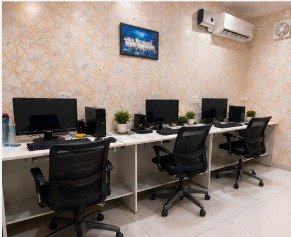 Open workstation bay at Vardhaman Co Working, Hisar